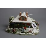 A BOXED LILLIPUT LANE SCULPTURE, 'Christmas at Woody Bay Station', L3126, with deeds