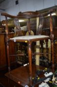 AN EDWARDIAN MAHOGANY AND INLAID CORNER CHAIR, and an oak firescreen/occasional table with