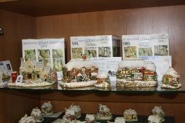 THREE BOXED LILLIPUT LANE SCULPTURES, 'Calling Home for Christmas', L3229, 'I Believe in Santa Paws'