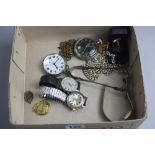 A BOX OF MISCELLANEOUS, to include two pocket watches, three wristwatches, silver sugar tongs,