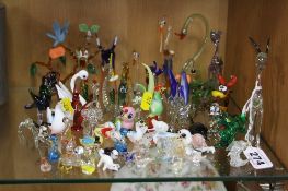 A GROUP OF GLASS LAMPWORK ANIMALS, etc