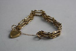 A 9CT GATE BRACELET, approximate weight 12.4 grams