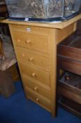 A TALL MARKS AND SPENCER LIGHT OAK CHEST, of five drawers