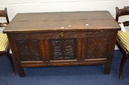 A GEORGIAN CARVED OAK TRIPLE PANEL COFFER, approximate size width 130cm x depth 54cm x height 72.