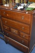A STAG MINSTREL CHEST OF SEVEN DRAWERS