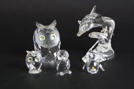 FIVE BOXED SWAROVSKI FIGURES, to include Dolphin (slight chips to fins), large Owl (chip to ear),