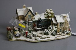 A BOXED LILLIPUT LANE SCULPTURE 'Homeward Bound for Christmas' L2575, with deeds (signal part