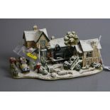 A BOXED LILLIPUT LANE SCULPTURE 'Homeward Bound for Christmas' L2575, with deeds (signal part