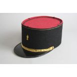 A SECOND HALF 20TH CENTURY FRENCH MILITARY CAP (KEPI), black and red felt, with gilt insigma and