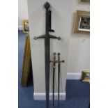 A LARGE 'EXCALIBUR' TYPE SWORD, approximate length 143cm, together with two Spanish swords (one