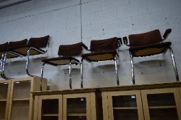 A SET OF SIX 1970'S TUBULAR STEEL FRAMED CHAIRS, chromed finish to frame, reupholstered in brown