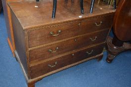A LATE 19TH CENTURY MAHOGANY CHEST, of three long drawers with drop swan neck handles and on