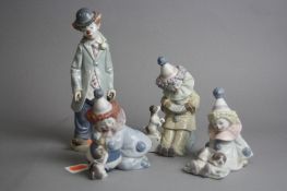 FOUR BOXED LLADRO FIGURES, 'Boy Pierrot with puppy', No 5277 'Boy Pierrot with ball and puppy' No