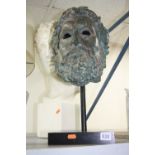 A CAST MYTHICAL HEAD, on stand, approximate height 48cm, together with plaster bust (sd) and a table