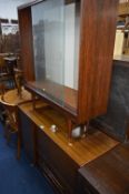 A LEBUS LINK TEAK SIDEBOARD, with one cupboard door next to a fall front cupboard over two drawers