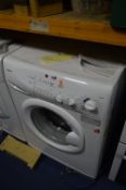 A HOOVER HNF7128 WASHING MACHINE, in white