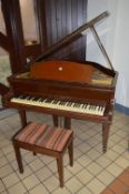 A 20TH CENTURY MAHOGANY MONINGTON & WESTERN, LONDON BABY GRAND PIANO, with double pedals, on brass