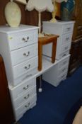 A MODERN WHITE DRESSING TABLE, pair of matching three drawer bedside chests and a modern
