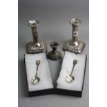 A PAIR OF SILVER CANDLESTICKS, approximate height 13cm, Birmingham 1912, another candlestick and two