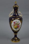 A COALPORT TWIN HANDLED VASE AND COVER, of baluster form, cobalt blue and gilt ground with central
