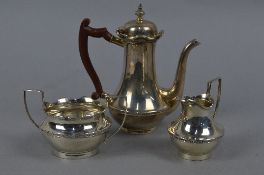 A GEORGE V SILVER BACHELOR'S COFFEE SET, castellated rims, cast narrow band of foliate design,