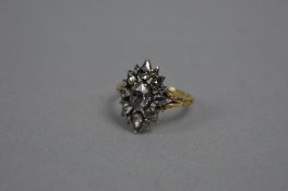 AN ORNATE ROSE CUT DIAMOND CLUSTER RING, estimated total pear and oval rose cut diamond weight 1.