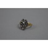 AN ORNATE ROSE CUT DIAMOND CLUSTER RING, estimated total pear and oval rose cut diamond weight 1.