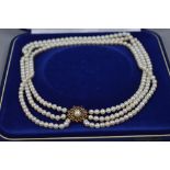 A LATE 20TH CENTURY THREE ROW CULTURED PEARL NECKLET, three rows of uniform Akoya cultured pearls,