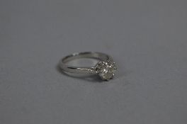 A MODERN PLATINUM SINGLE STONE DIAMOND RING, estimated modern round brilliant cut weight