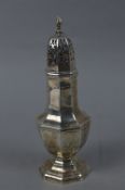 A GEORGE V OCTAGONAL SILVER SUGAR CASTOR, flame finial, stepped foot, makers James Deakin & Sons,