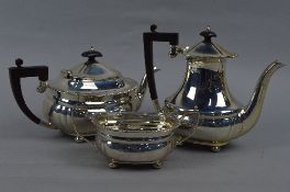 AN ELIZABETH II THREE PIECE SHAPED OVAL TEASET, gadrooned rims, bun feet, the teapot and coffee