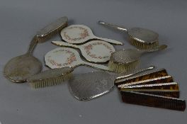 THREE ELIZABETH II SILVER AND WHITE ENAMEL HAND MIRRORS, decorated with a dog rose design, maker