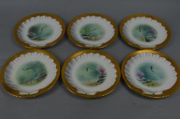 A SET OF SIX EDWARDIAN MINTON FISH PLATES, handpainted by A.H. Wright, retailed by Tiffany & co, New