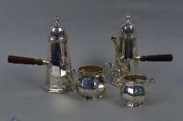 A GEORGE V GOLDSMITHS AND SILVERSMITHS COMPANY LIMITED FOUR PIECE SILVER CAFE AU LAIT SET, octagonal