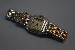 A CARTIER STEEL PANTHERE BRACELET WRISTWATCH, bi-colour quartz, the square case signed Cartier and