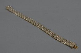 A LATE 20TH CENTURY 18CT GOLD DIAMOND SET FLAT LINK BRACELET, estimated total diamond weight