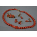 A CORAL BEAD NECKLACE, round coral beads graduating in size from 6.0mm - 11.5mm, necklace