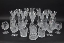 A PART SUITE OF STUART CRYSTAL BEACONSFIELD PATTERN DRINKING GLASSES AND TABLEWARE, comprising
