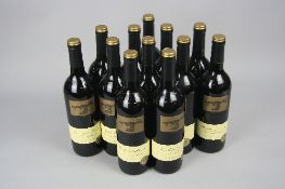 A BOX OF TWELVE BOTTLES OF THE 'BLACK STUMP; DURIF SHIRAZ 2011, 14%, 75cl, a highly commended wine