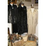 A BLACK LACE/BEADED CAPE, two raincoats, fur hat, faux fur coat, a rug from Oriental carpet