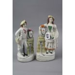 A PAIR STAFFORDSHIRE FIGURES, gentleman standing next to a well with arm around an urn and lady next