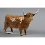 A BESWICK HIGHLAND COW, No.1740 (restorations to horn)