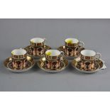 A SET OF FIVE ROYAL CROWN DERBY IMARI COFFEE CANS AND SAUCERS, '1128' pattern