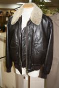 A HUGO BOSS GENTS BROWN LEATHER JACKET, with detachable collar, stitched in label on the inside