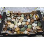 A COLLECTION OF HARDSTONE EGGS, VASES ETC, to include onyx