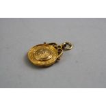 A 9CT FOOTBALL WINNER MEDAL, marked D.C & D.L winners 1929-1930 'R.Allison', total weight