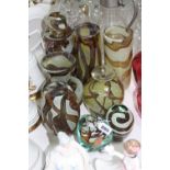 A GROUP OF MDINA GLASS, consisting of vases, a decanter and paperweights, all in the earth tone
