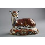 A ROYAL CROWN DERBY PAPERWEIGHT, 'Deer' exclusively for collectors guild, gold stopper