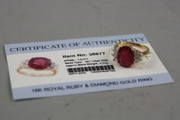 A 18CT RUBY AND DIAMOND RING (with gems TV certificate), ring size R, approximate weight 5.6 grams