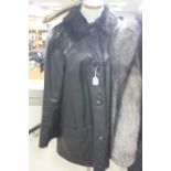 A REVERSIBLE LADIES FUR/LEATHER JACKET